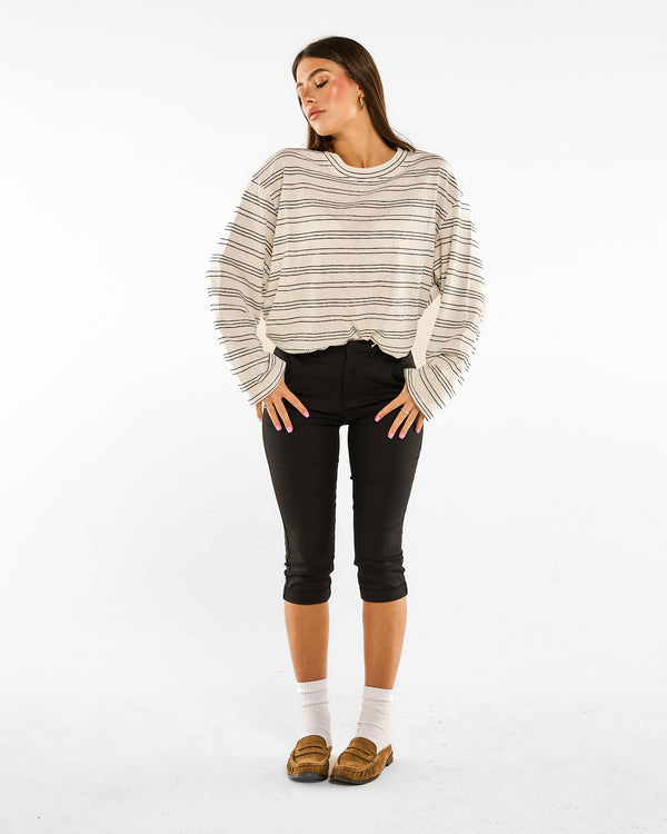 Pantaloni capri