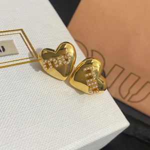 Orecchini a cuore bombato logo miu