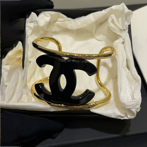 Bracciale rigido gold/black cc