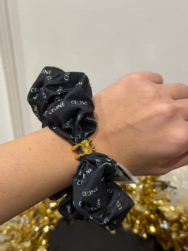 Elastico sera Celine con logo oro