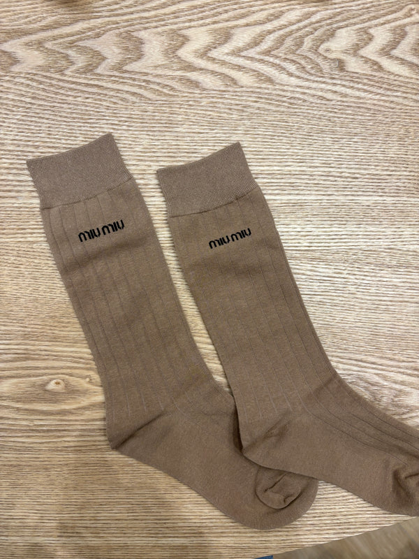 Calzini Miu Miu in cotone beige con logo nero