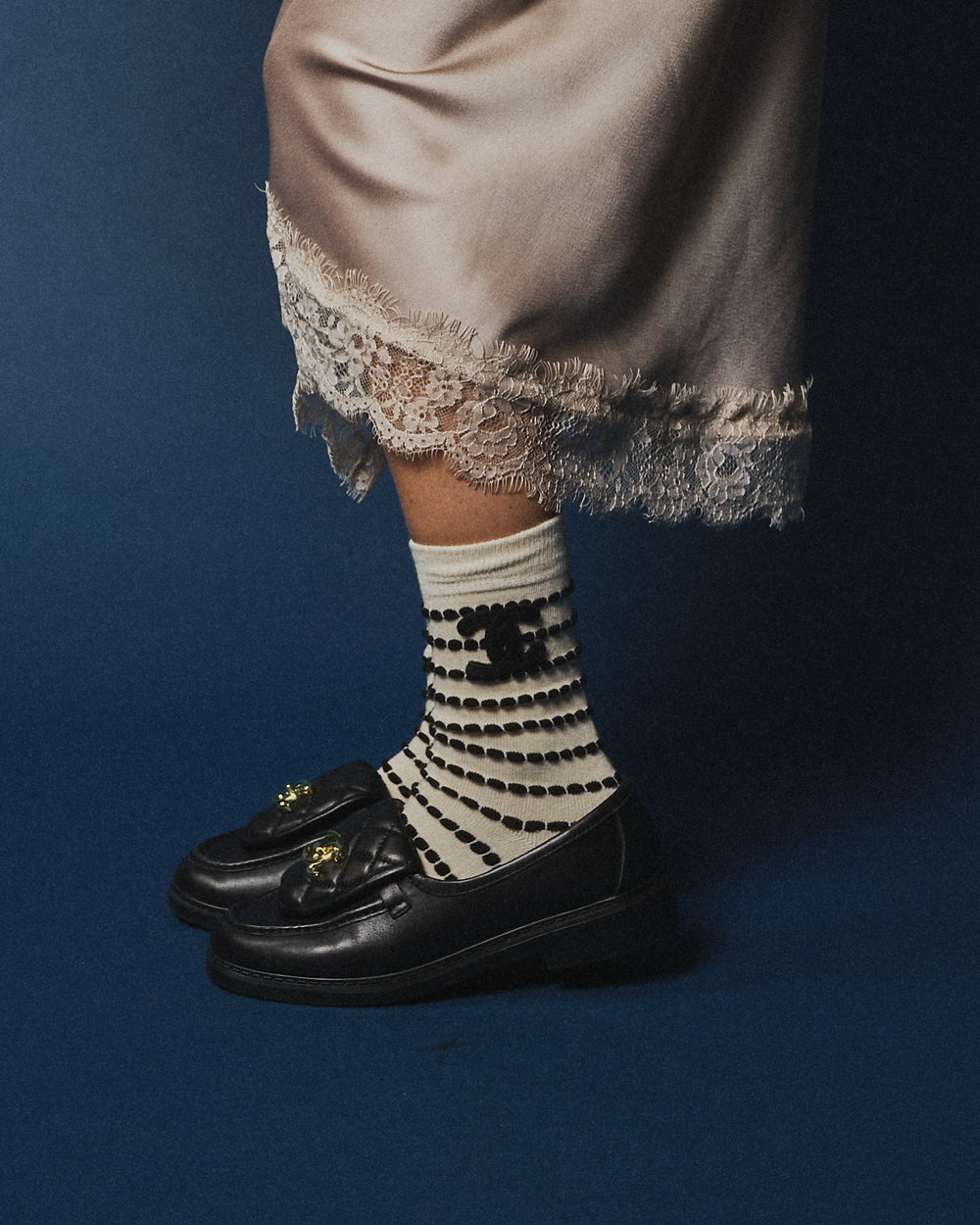 Pack 2 calzini Chanel con trama panna/nero