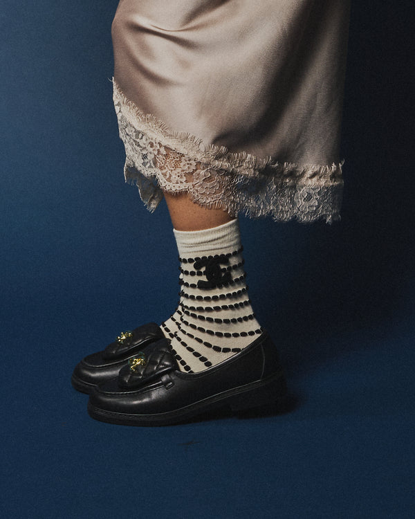 Pack 2 calzini Chanel con trama panna/nero