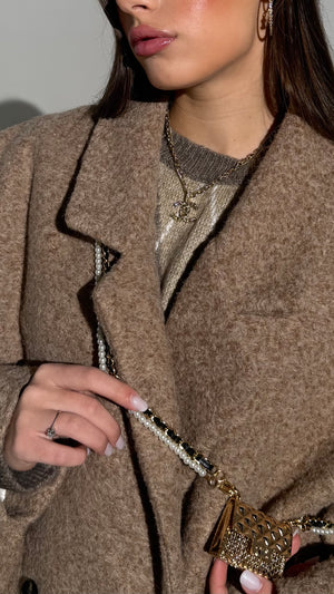 Collana doppio filo con pendente iconico