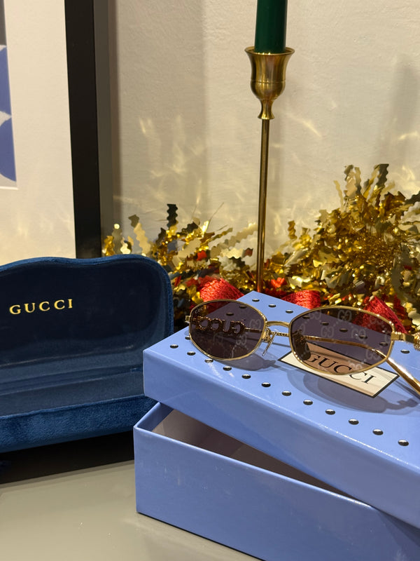 Occhiali gucci con scritta strass