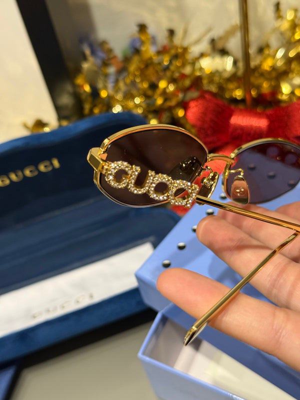 Occhiali gucci con scritta strass