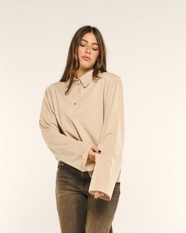 Polo clean con spalline