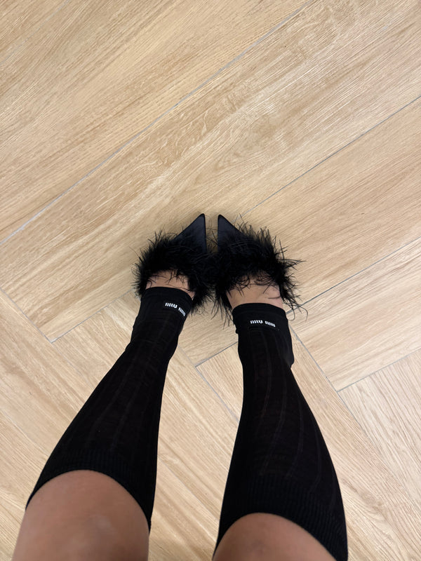 Calzini lunghi Miu Miu neri rigati con logo