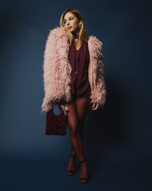 Pelliccia Teddy con cintura rosa