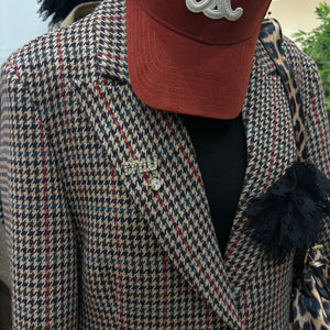 Spilla Miu Miu con goccia strassata