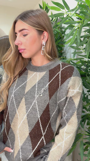 Spilla Ysl martellata con perla